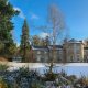 “Front view of Coul House Hotel with frosted grounds and soft winter light.”