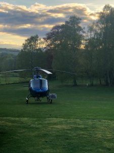 Luxury hotel grounds Scottish Highlands Coul House Helicopter landing on the lawn